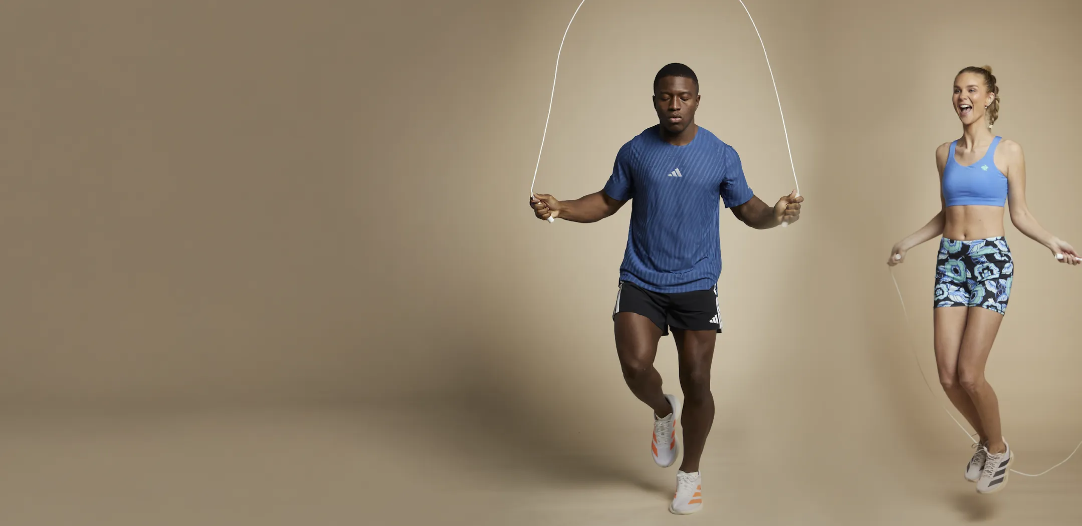 2 people jump roping in athletic apparel